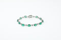 Pulseira Rivière Ovale Ouro Branco Esmeralda