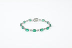 Pulseira Rivière Ovale Ouro Branco Esmeralda