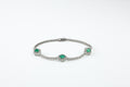 Pulseira Rivière Jardin Ouro Branco Esmeralda